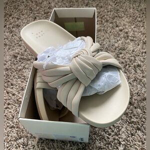Target - cream knotted slide